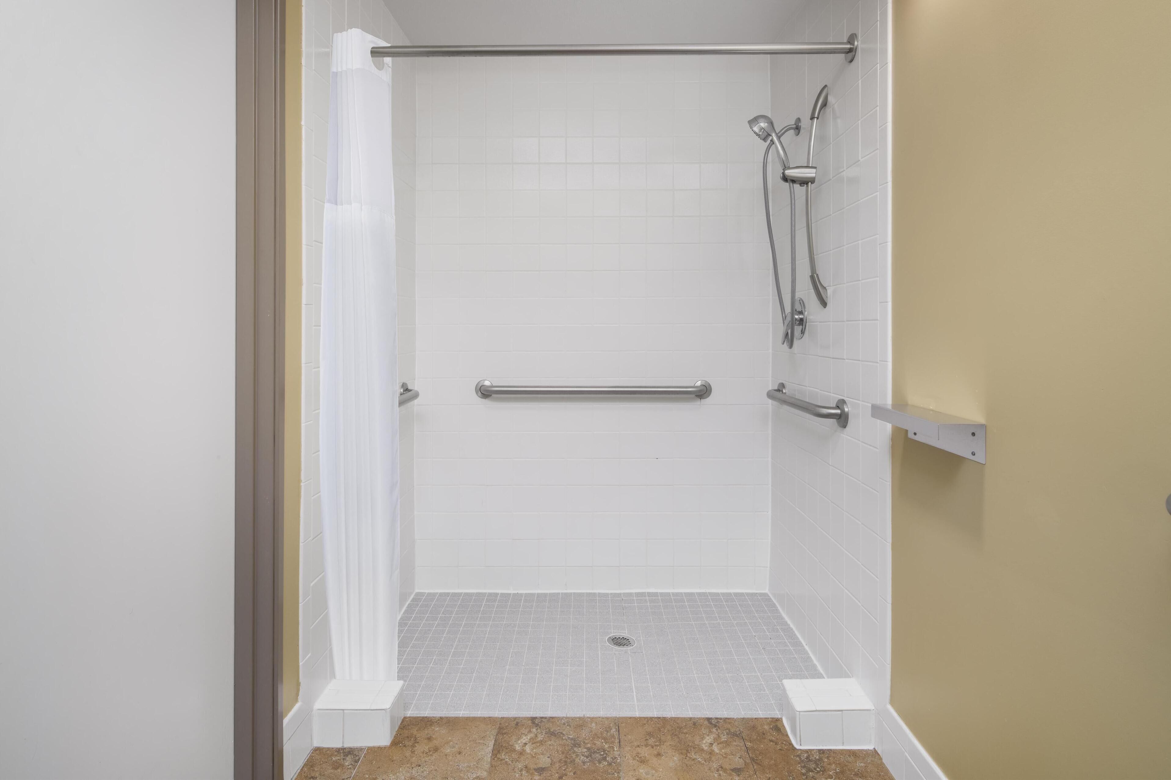 combined shower/bathtub, eco-friendly toiletries, hair dryer, towels