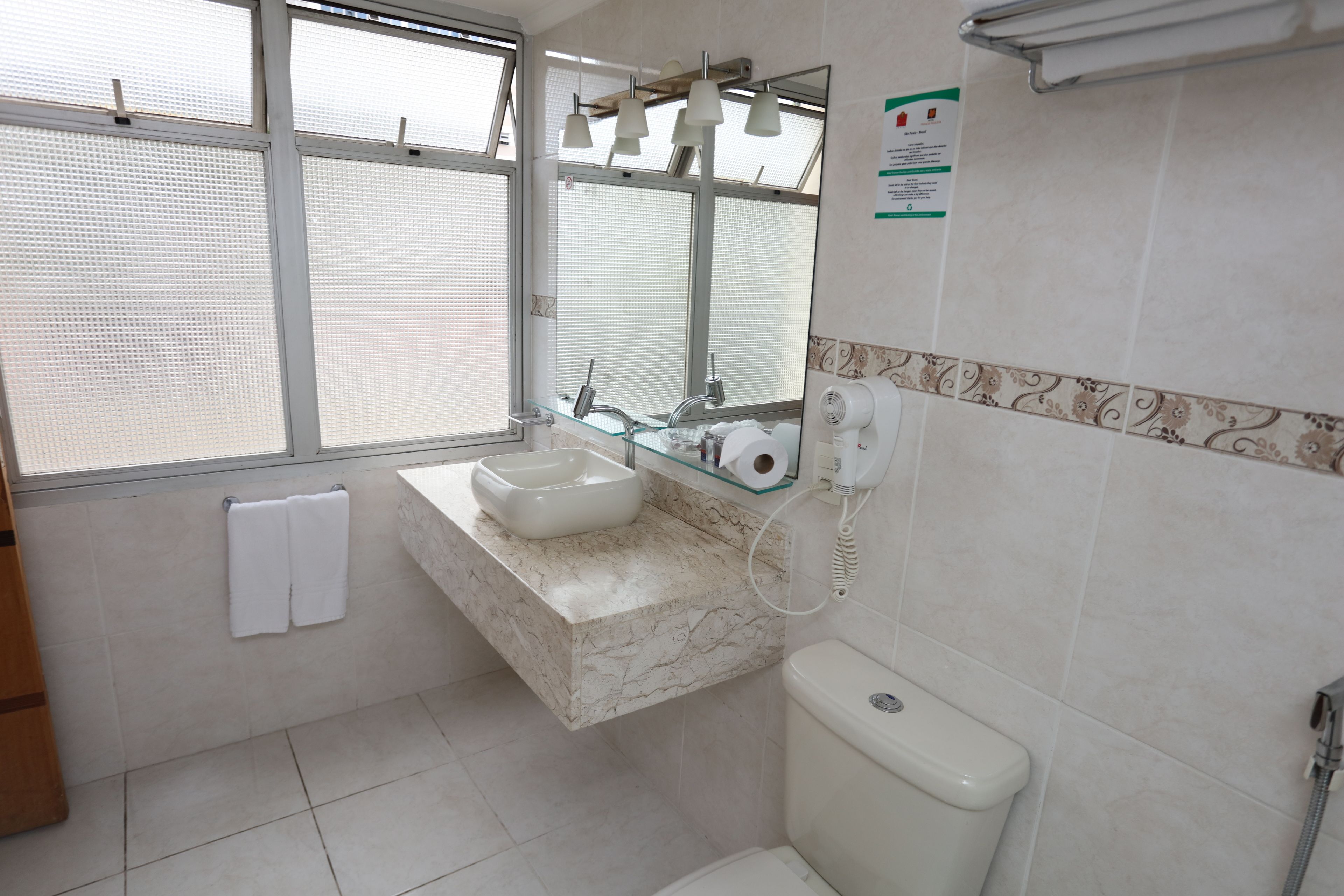 superior double torre 1 | bathroom | shower, rainfall showerhead, hair dryer, towels