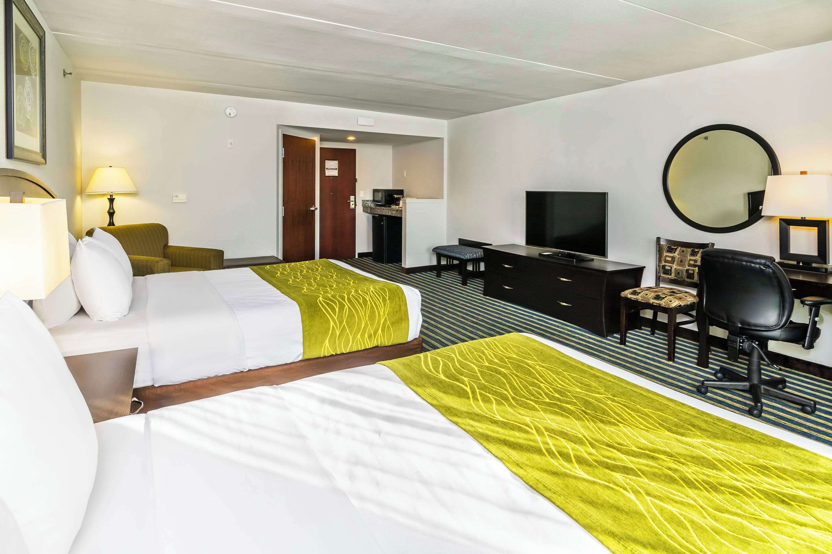 desk, laptop workspace, blackout curtains, iron/ironing board