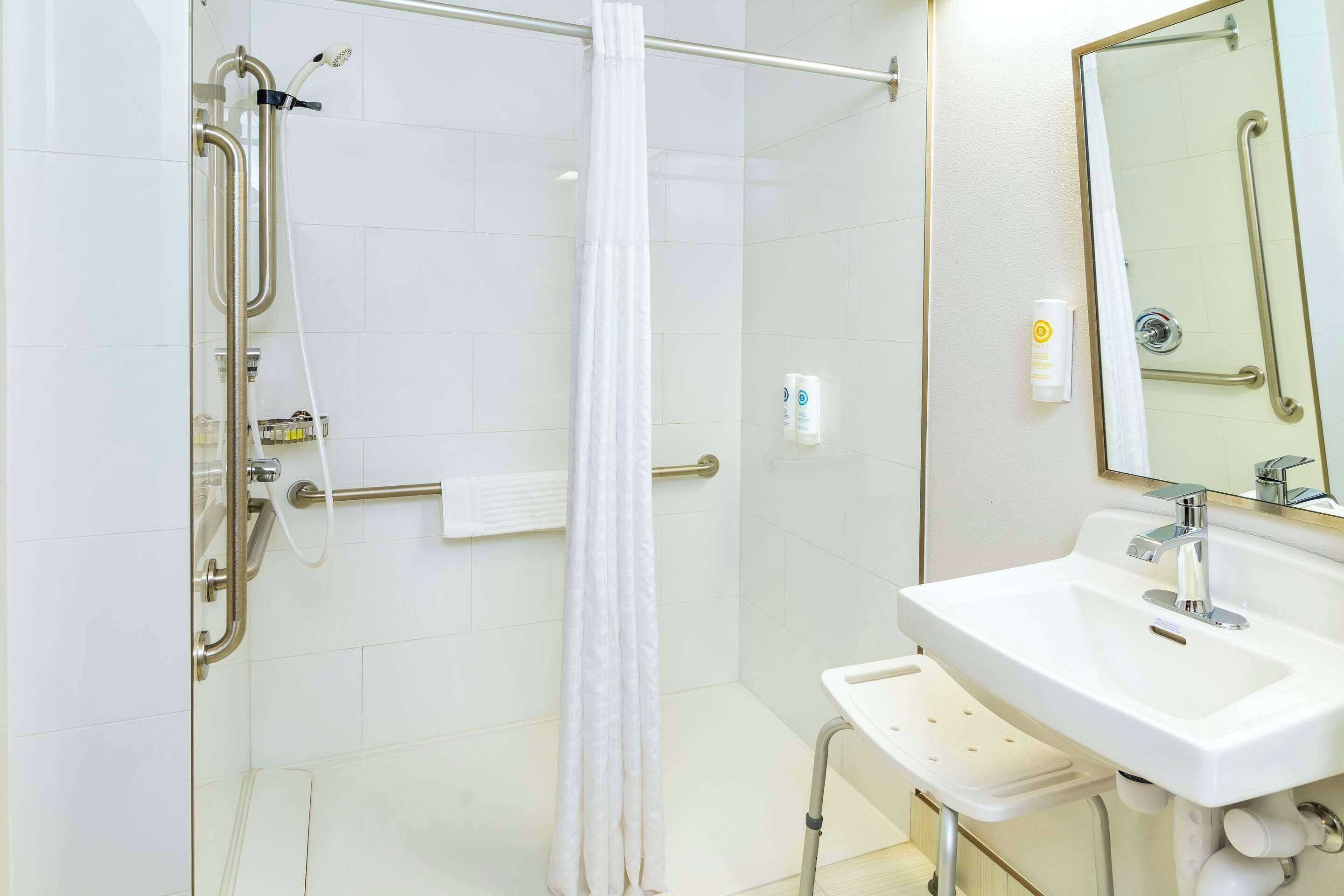 desk, laptop workspace, blackout curtains, iron/ironing board