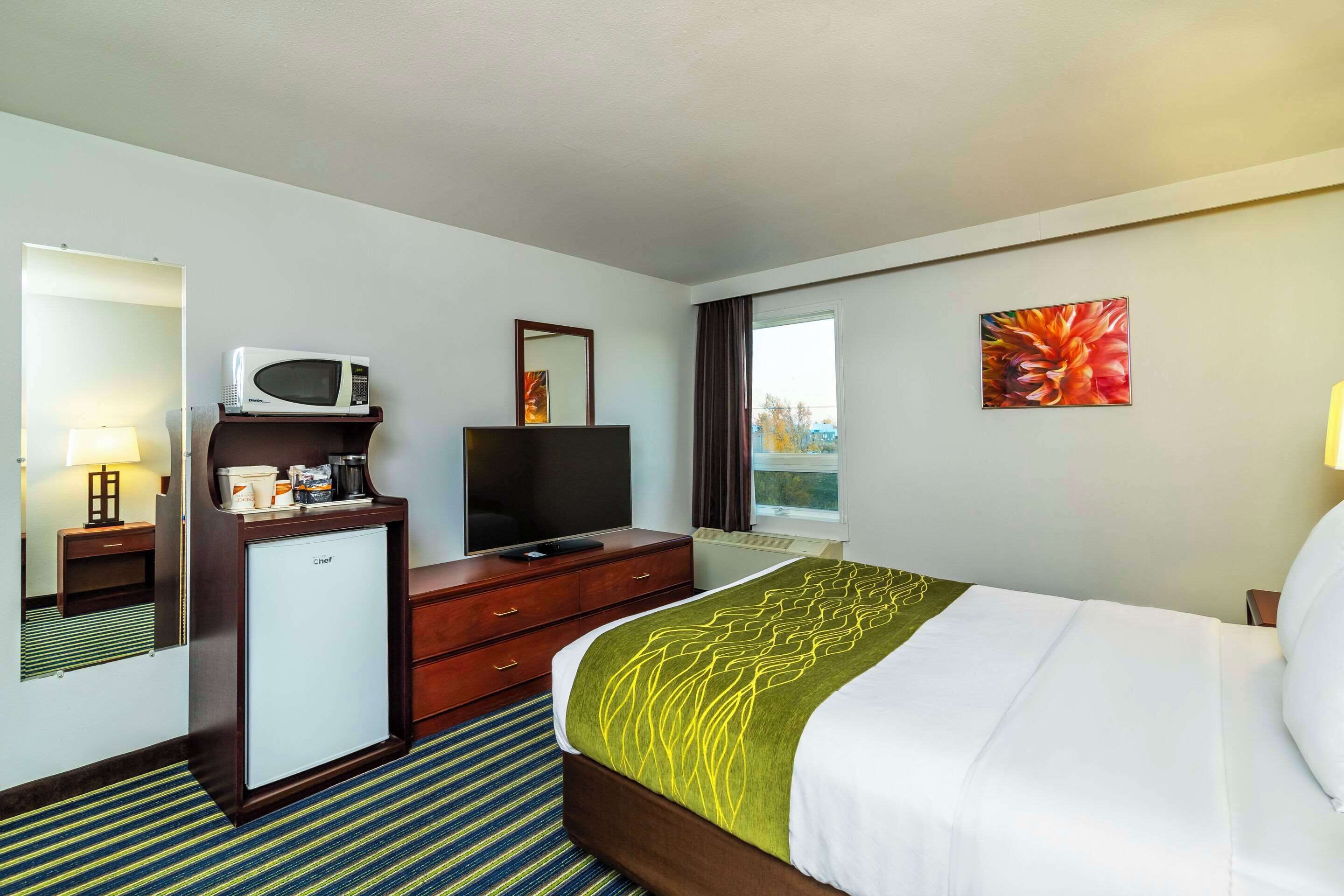 desk, laptop workspace, blackout curtains, iron/ironing board