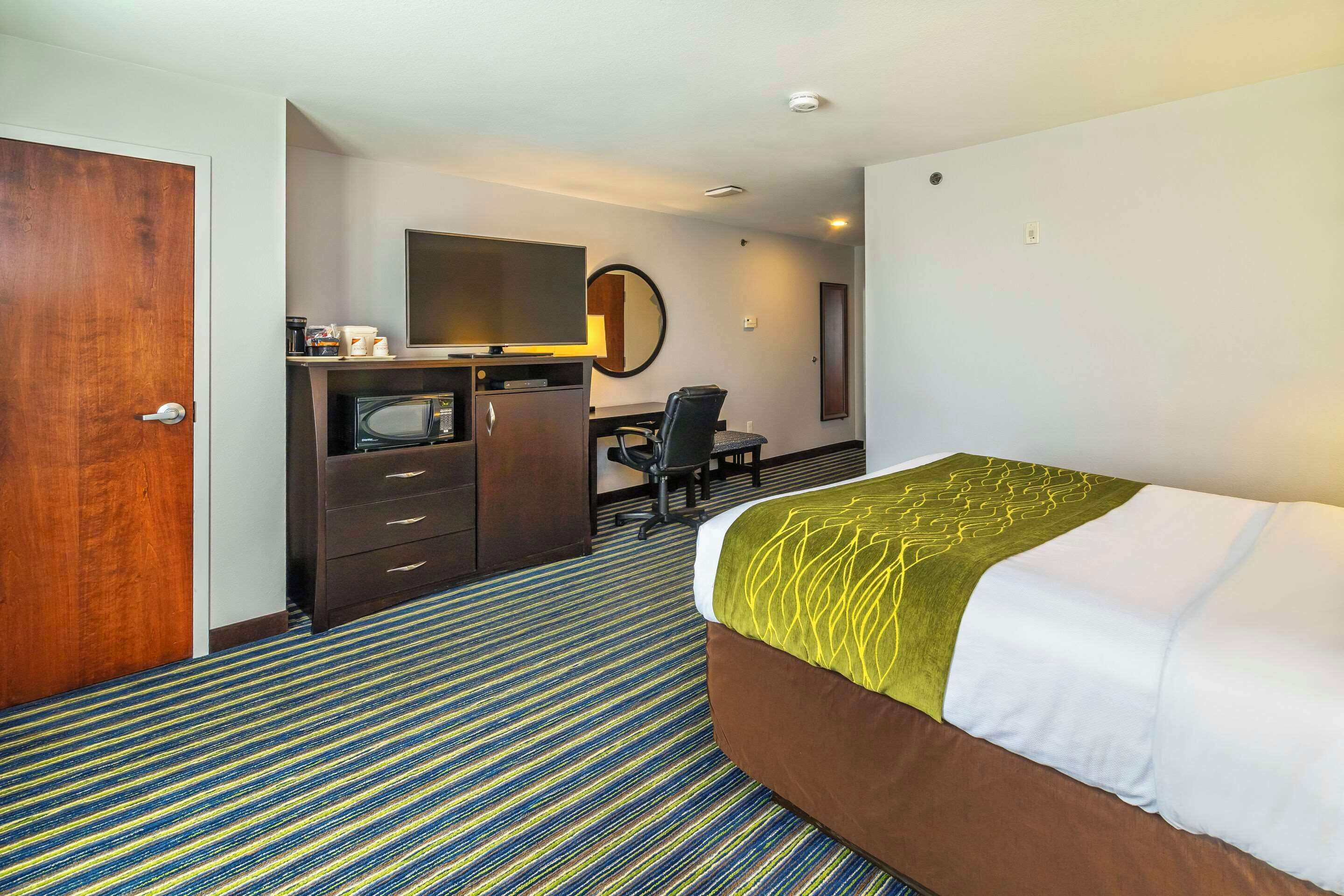 desk, laptop workspace, blackout curtains, iron/ironing board