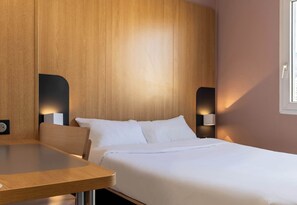 Premium bedding, down comforters, in-room safe, desk