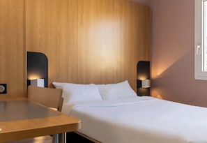 Premium bedding, down comforters, in-room safe, desk