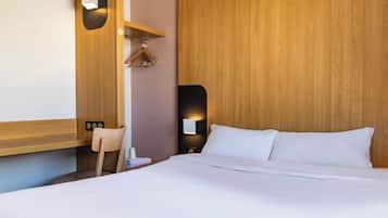 Premium bedding, down duvets, in-room safe, desk