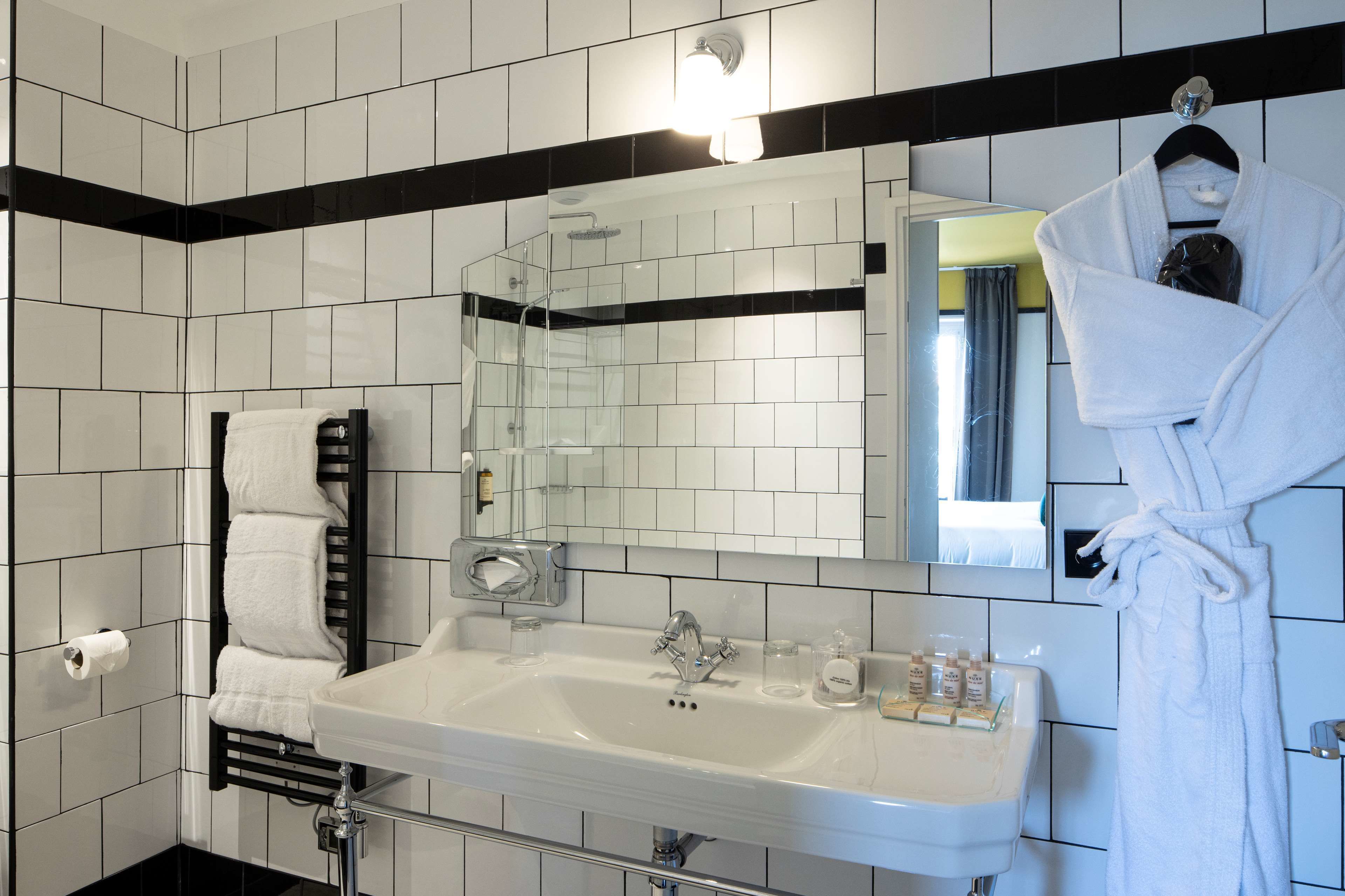 junior suite, 1 king bed, non smoking (twin bed on request;with sofabed) | bathroom | shower, rainfall showerhead, designer toiletries, hair dryer