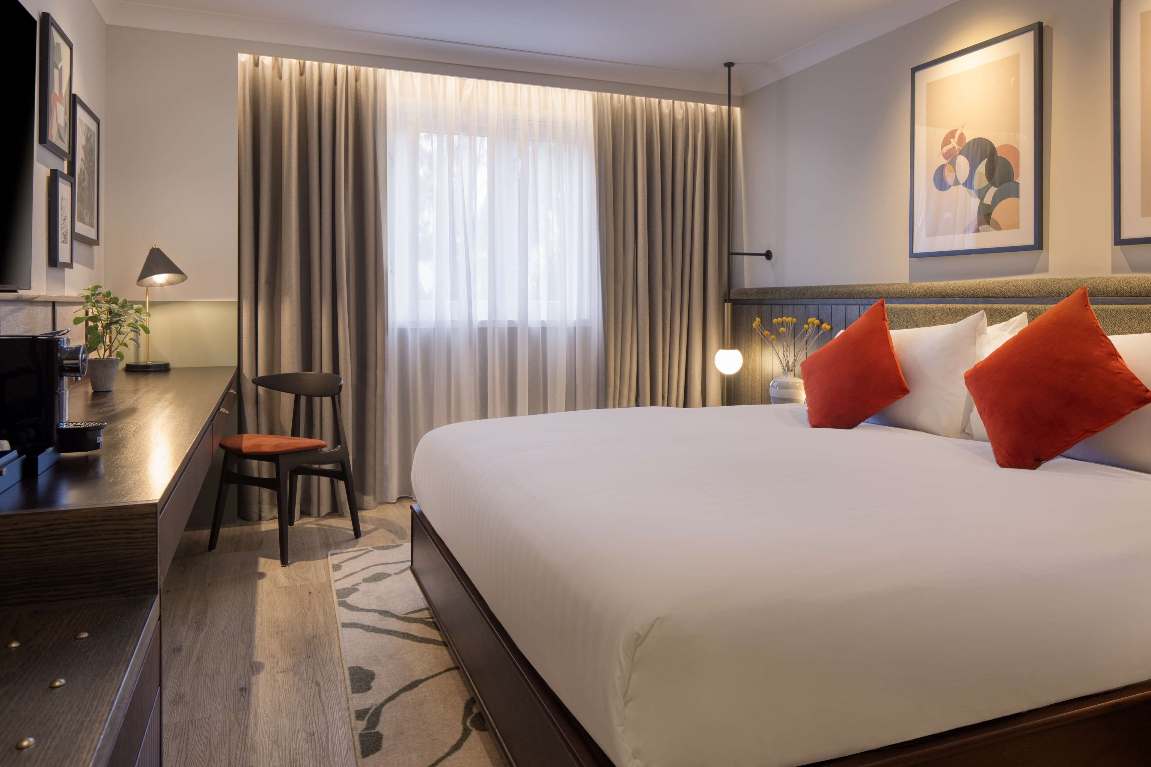 deluxe room, 1 king bed | in-room safe, desk, soundproofing, iron/ironing board