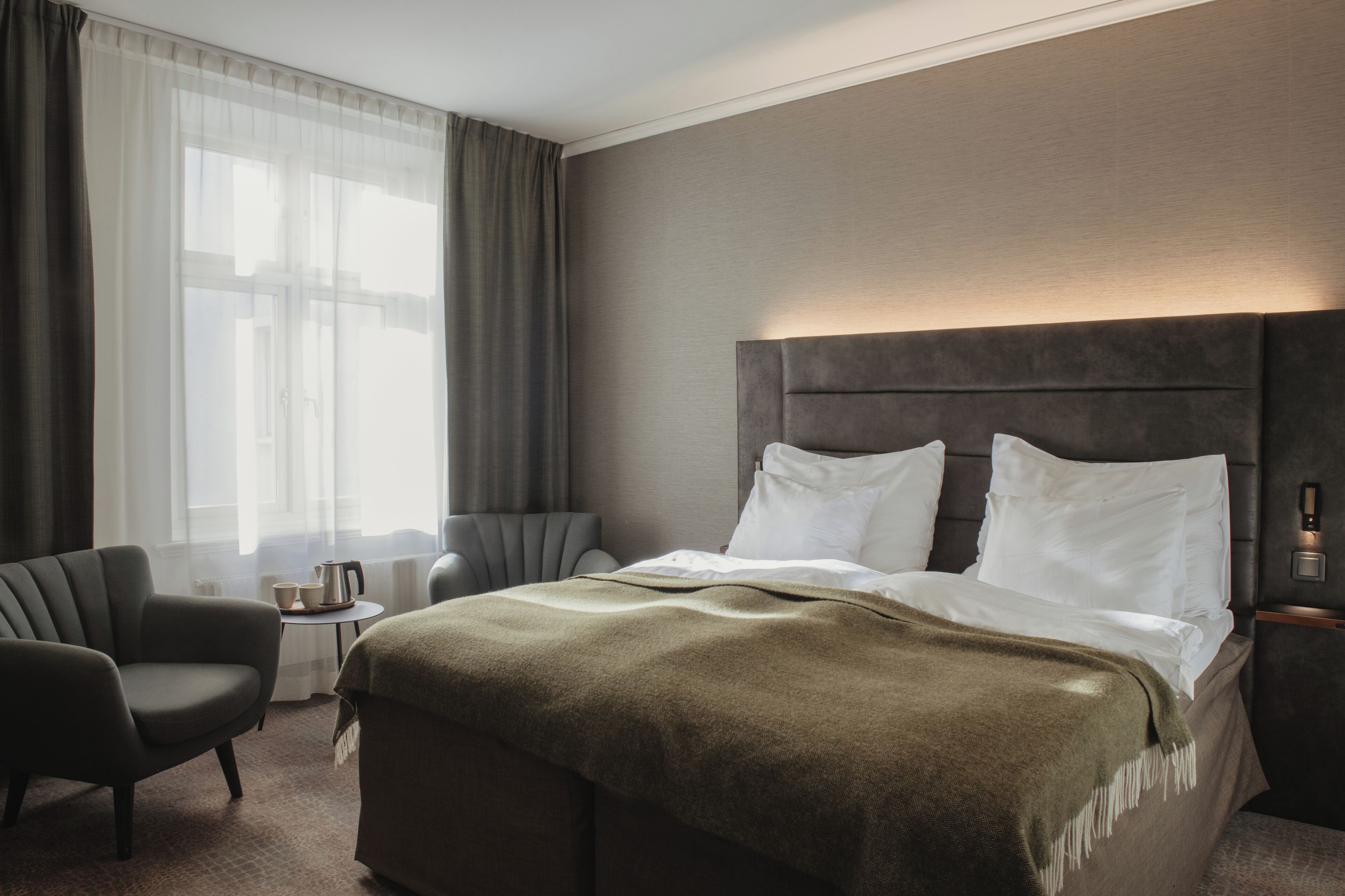 Desk, blackout drapes, iron/ironing board, cribs/infant beds