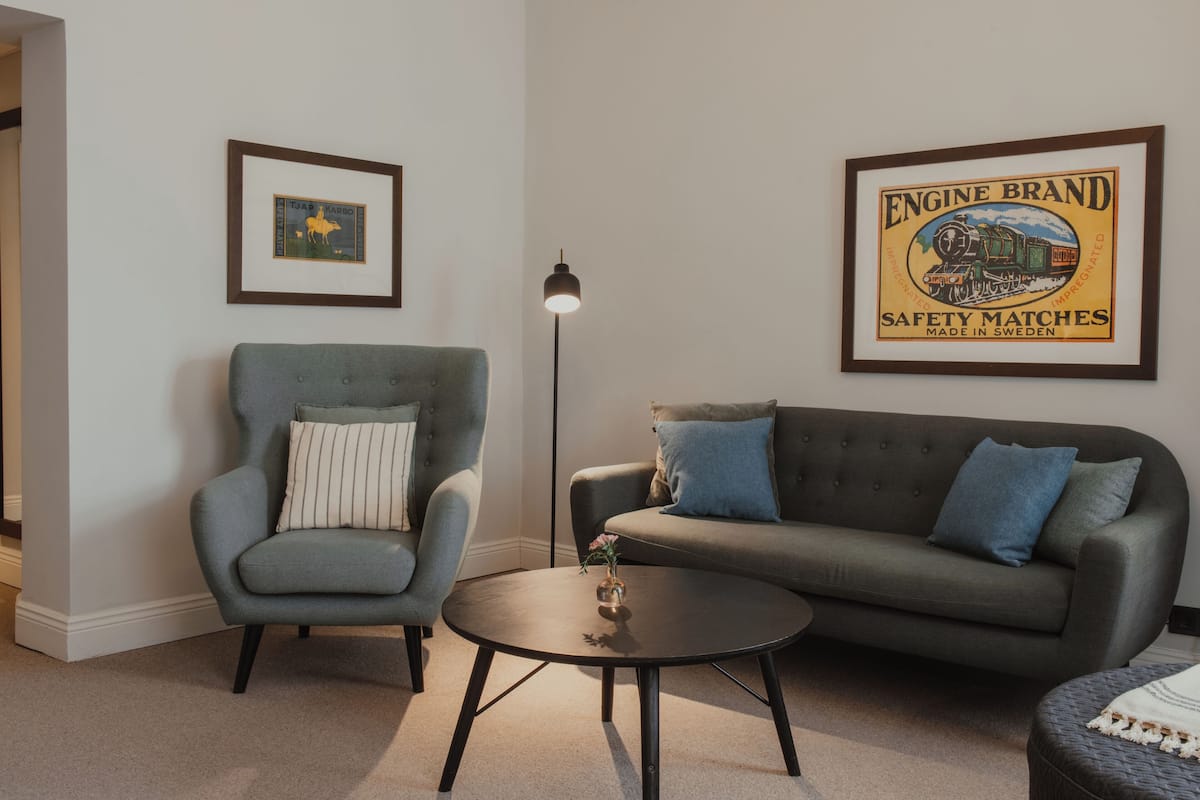 Suite, 1 Double Bed, Non Smoking | Desk, blackout drapes, iron/ironing board, cribs/infant beds