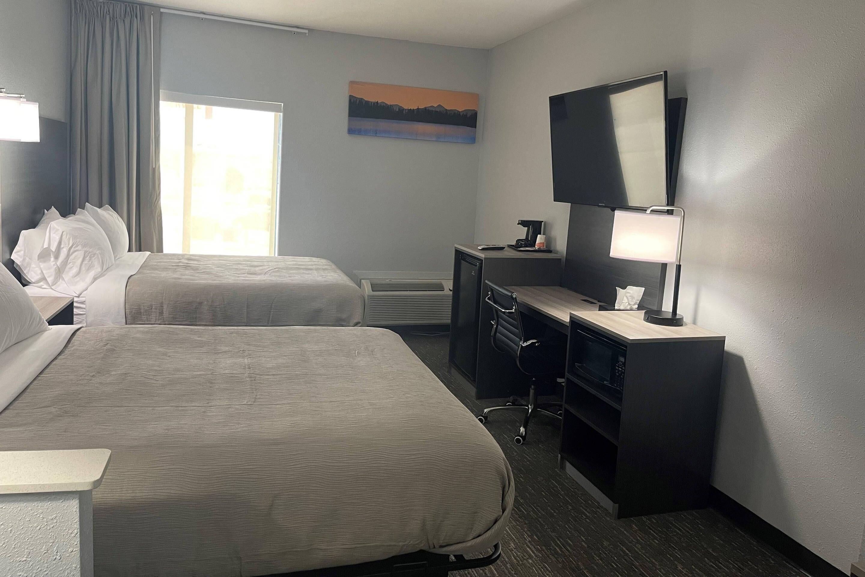 Suite, 2 Queen Beds, Non Smoking | Desk, iron/ironing board, free WiFi, bed sheets