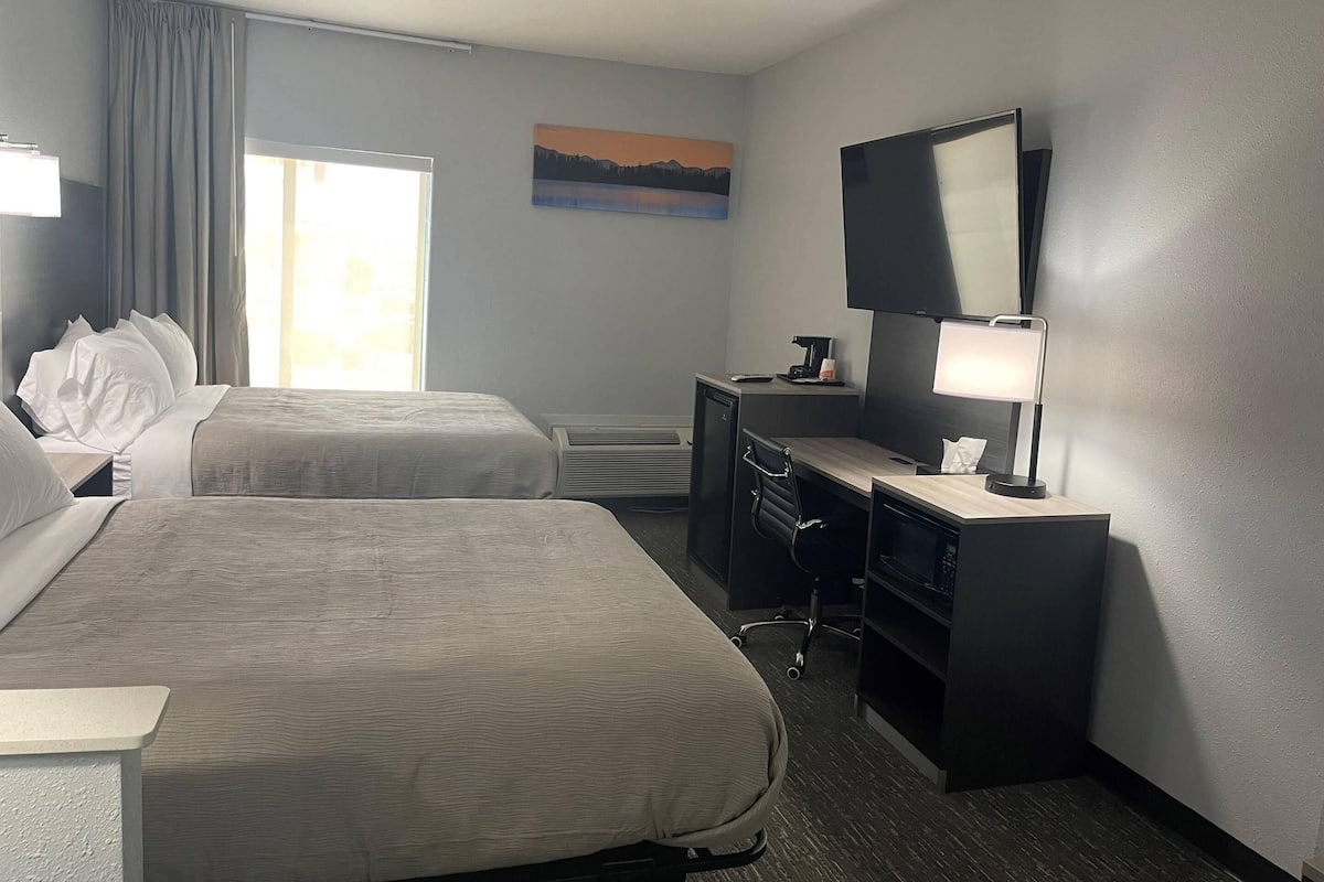 Suite, 2 Queen Beds, Non Smoking | Desk, iron/ironing board, free WiFi, bed sheets