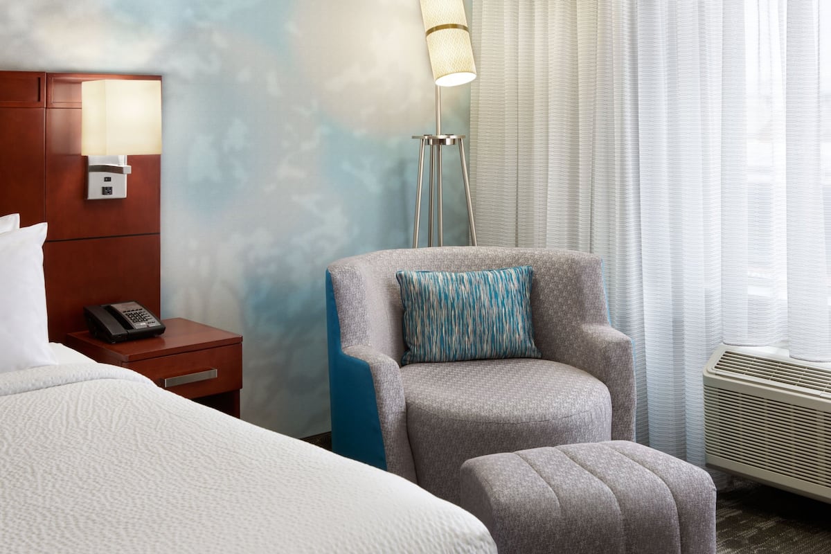 Premium bedding, blackout curtains, soundproofing, iron/ironing board