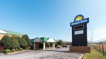 Experience the charm of the Sun Inn, surrounded by a serene natural landscape and convenient parking.