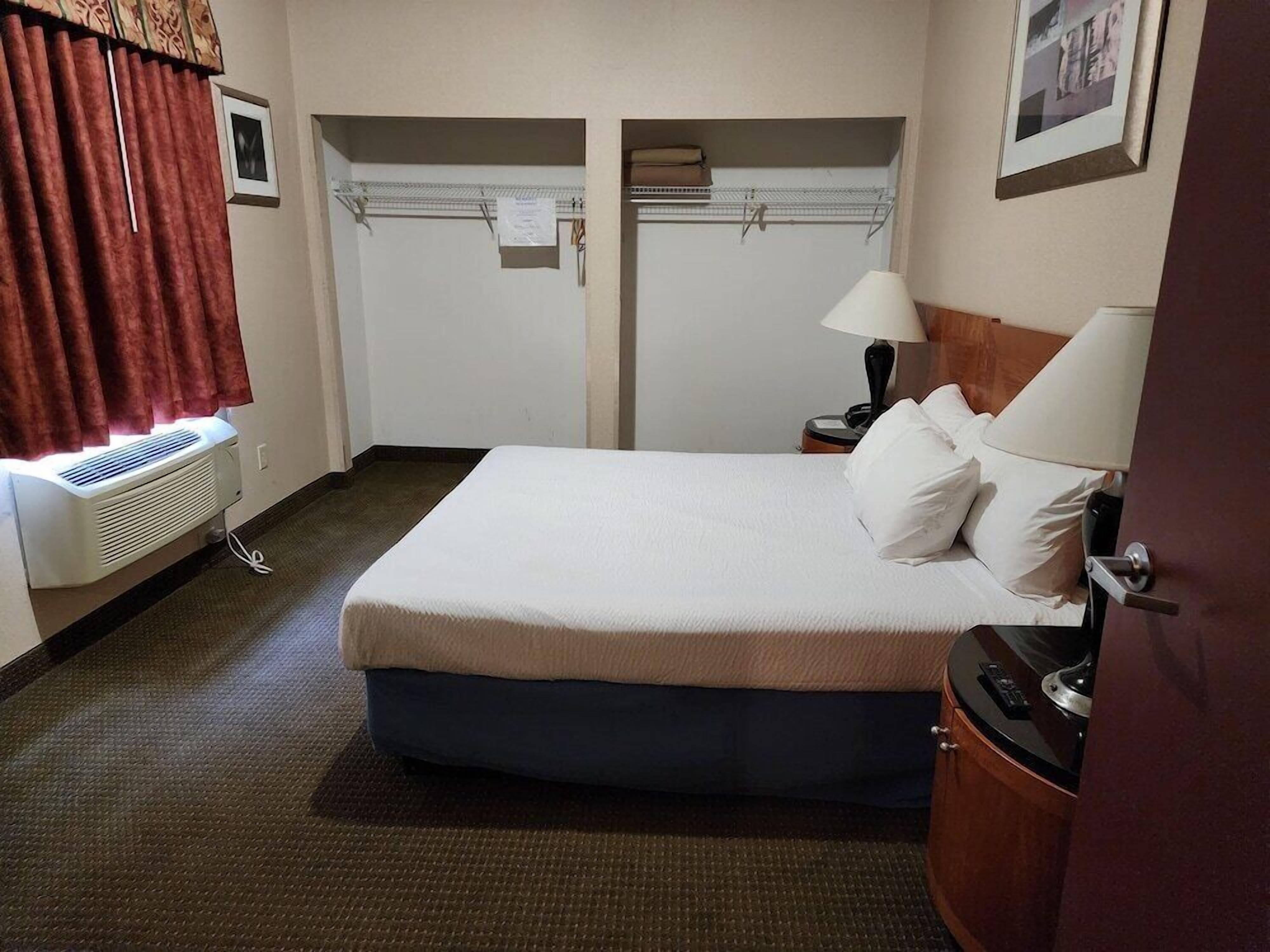 Desk, blackout drapes, iron/ironing board, free WiFi