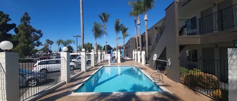 Outdoor pool, open 9:00 AM to 9:00 PM, sun loungers