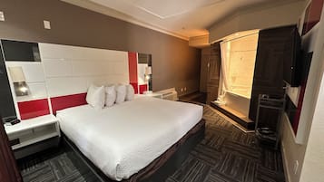Suite, 1 kingsize bed, niet-roken | Pillowtop-bedden, individueel gedecoreerd, een bureau