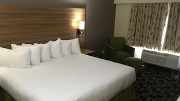 Room, 1 King Bed, Non Smoking | Pillowtop beds, individually decorated, desk, blackout drapes