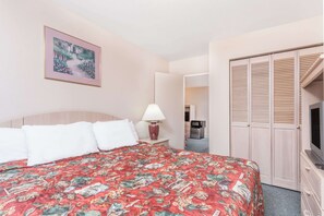 Suite, 1 King Bed, Refrigerator & Microwave | Pillowtop beds, blackout drapes, iron/ironing board, free WiFi