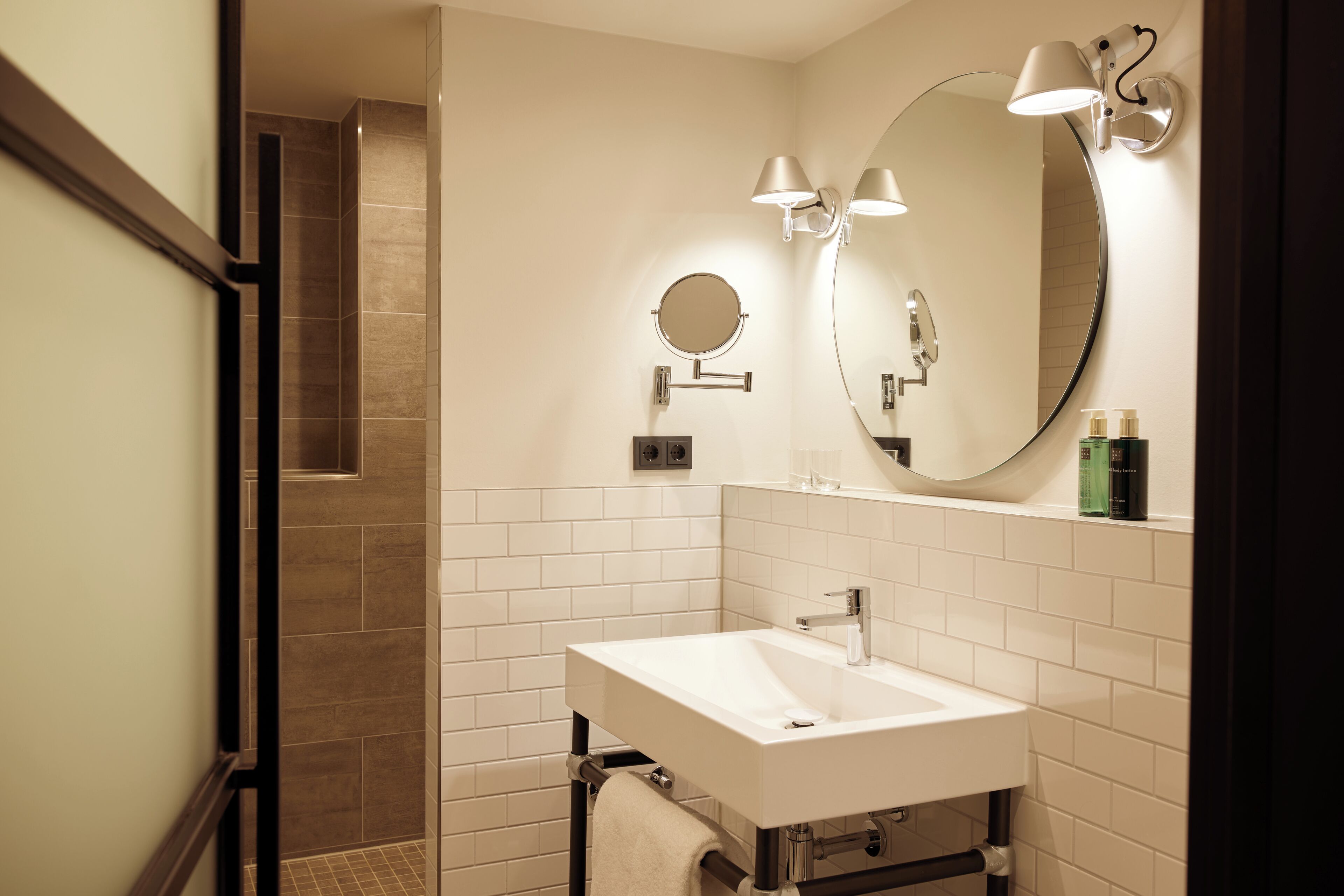 eco-friendly toiletries, hair dryer, slippers, towels