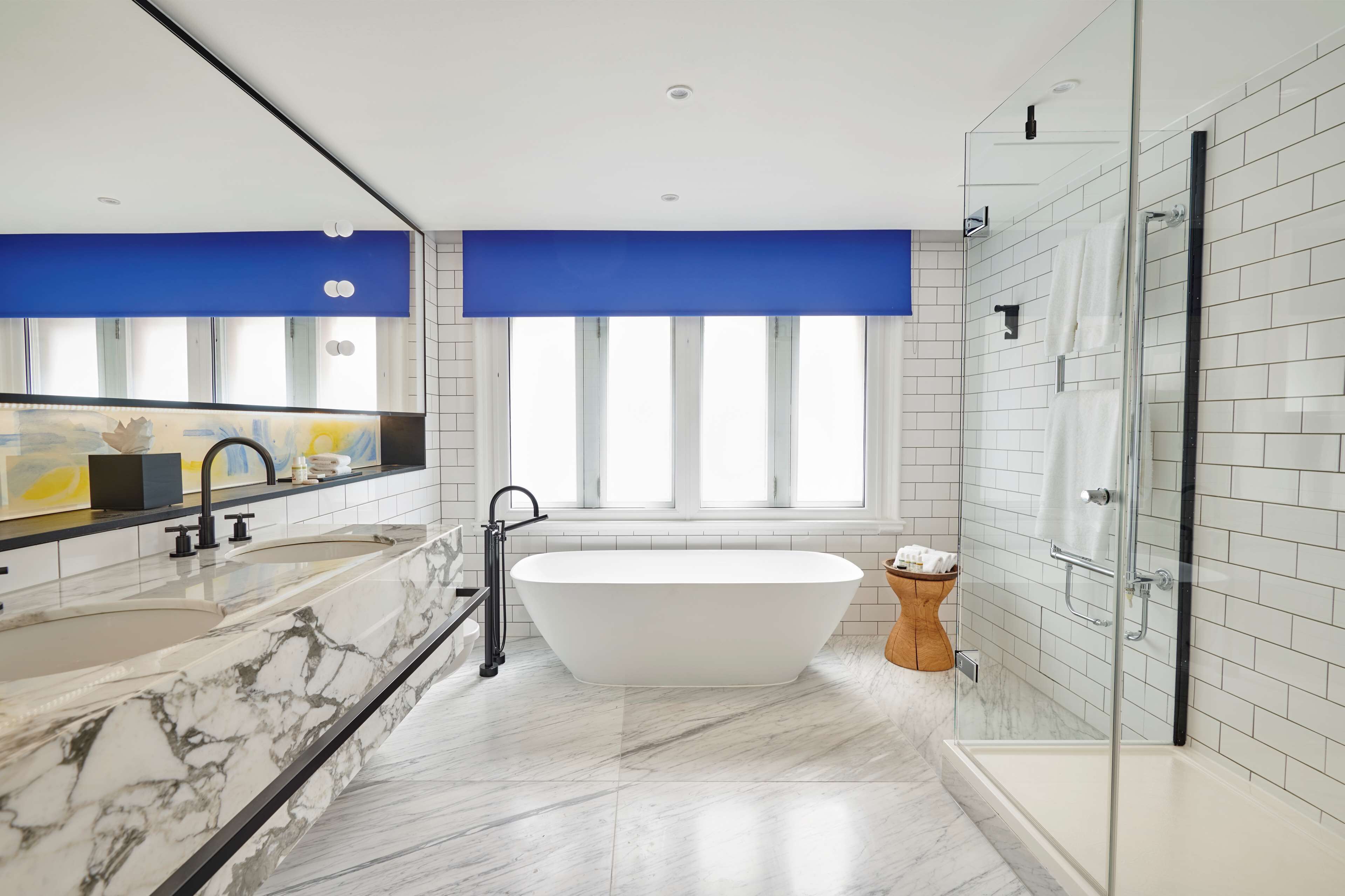 suite (104) | bathroom | designer toiletries, hair dryer, bathrobes, slippers