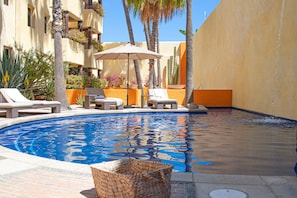 Outdoor pool, pool umbrellas, pool loungers