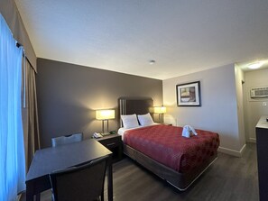 Standard Room, 1 Queen Bed, Non Smoking | 1 bedroom, pillowtop beds, laptop workspace, blackout drapes