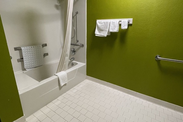 Room, 1 King Bed, Accessible | Bathroom | Combined shower/tub, free toiletries, hair dryer, towels