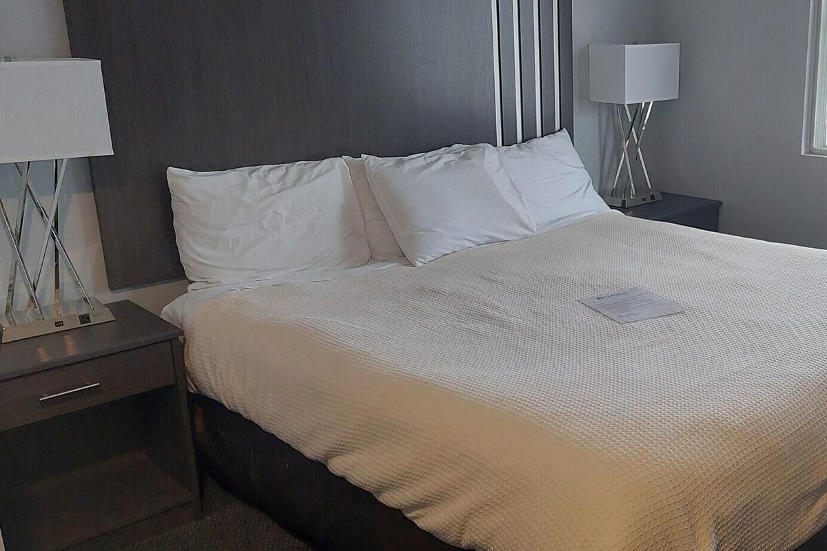 Blackout drapes, iron/ironing board, WiFi (free), bed sheets
