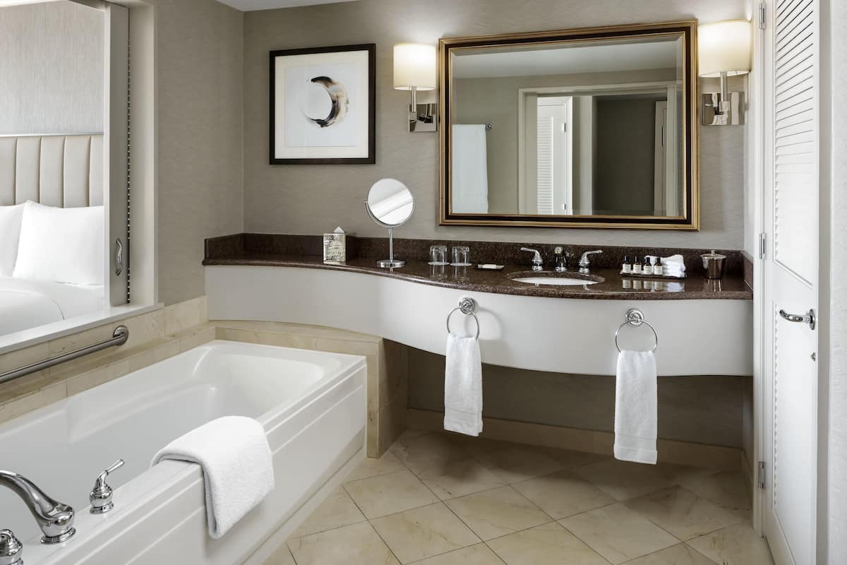 Premium bedding, down comforters, pillowtop beds, minibar