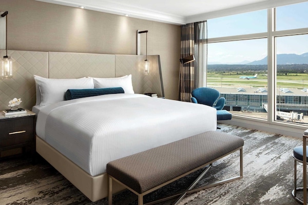 Premium bedding, down comforters, pillowtop beds, minibar