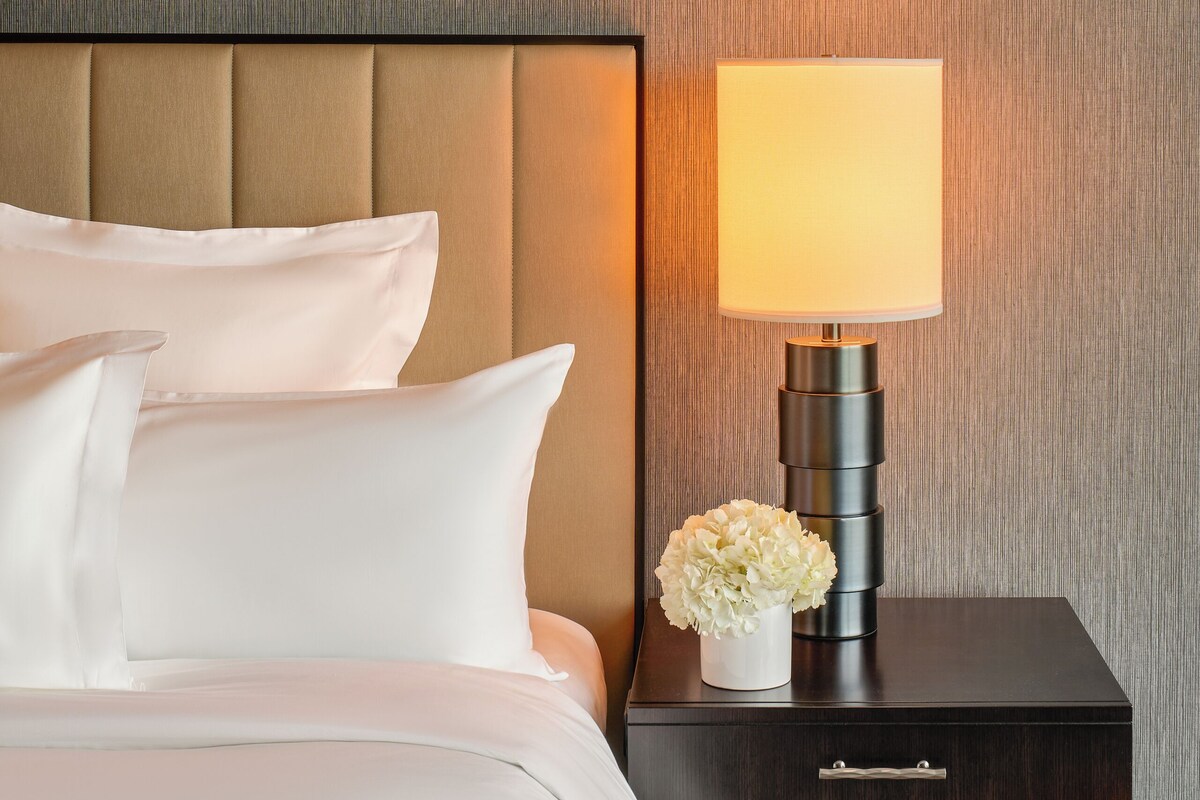 Premium bedding, down comforters, pillowtop beds, minibar