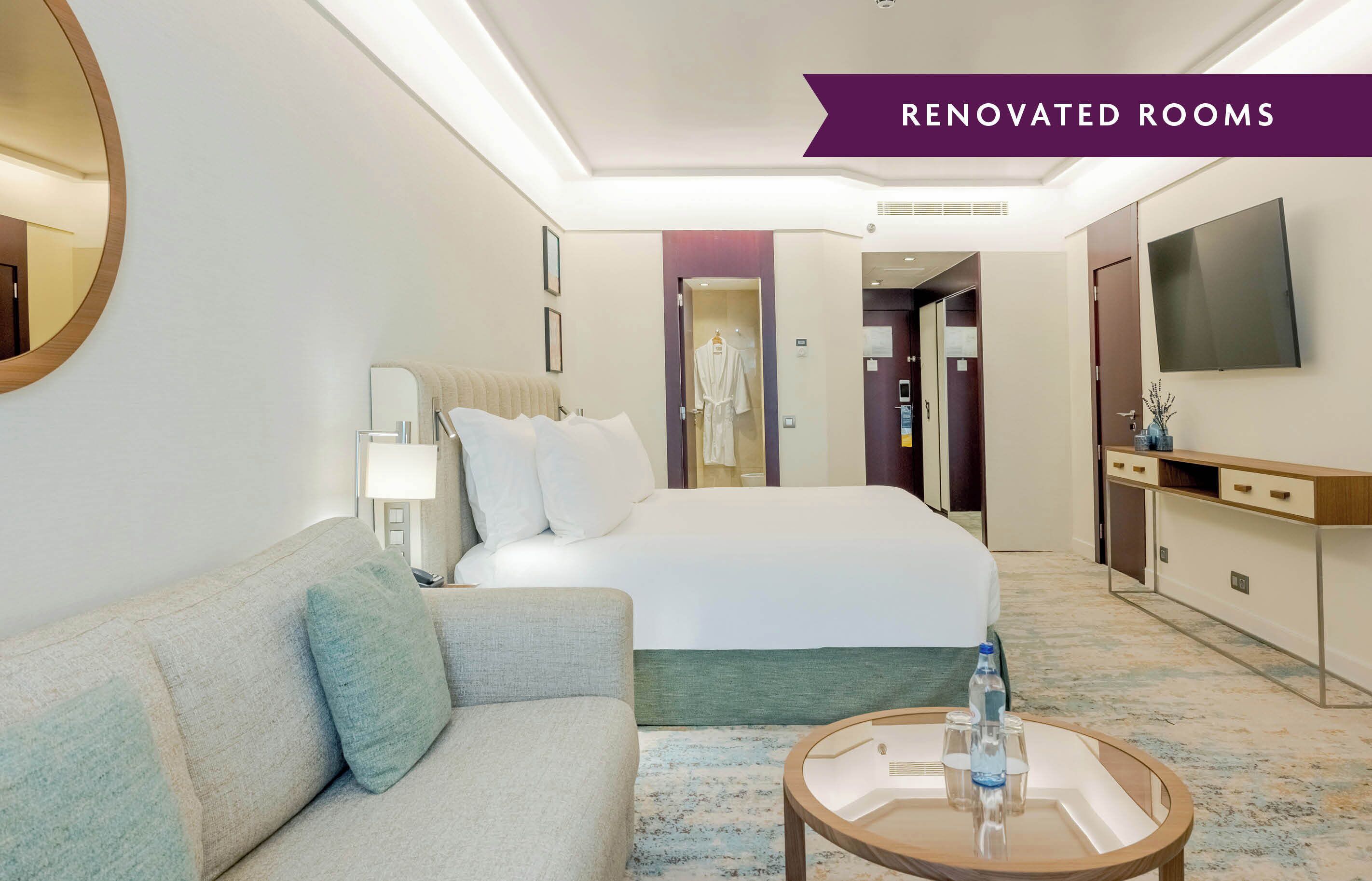 Suite Junior, 1 Tempat Tidur King | Seprai premium, minibar, brankas, dan meja kerja