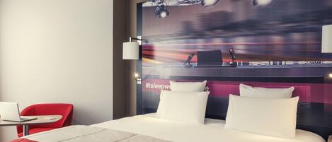 Ropa de cama de alta calidad y minibar