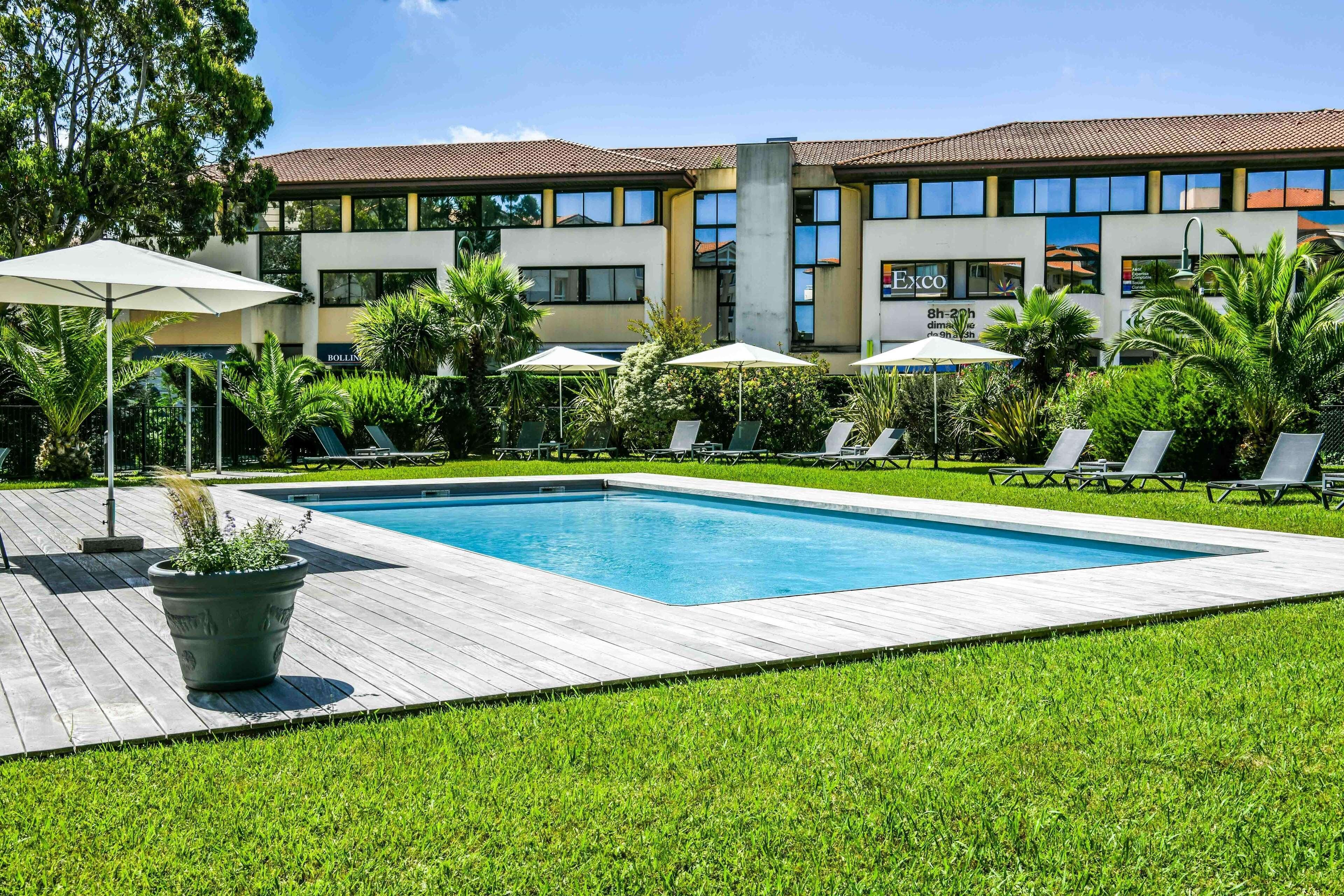 Seasonal outdoor pool, open 10:00 AM to 9:00 PM, sun loungers