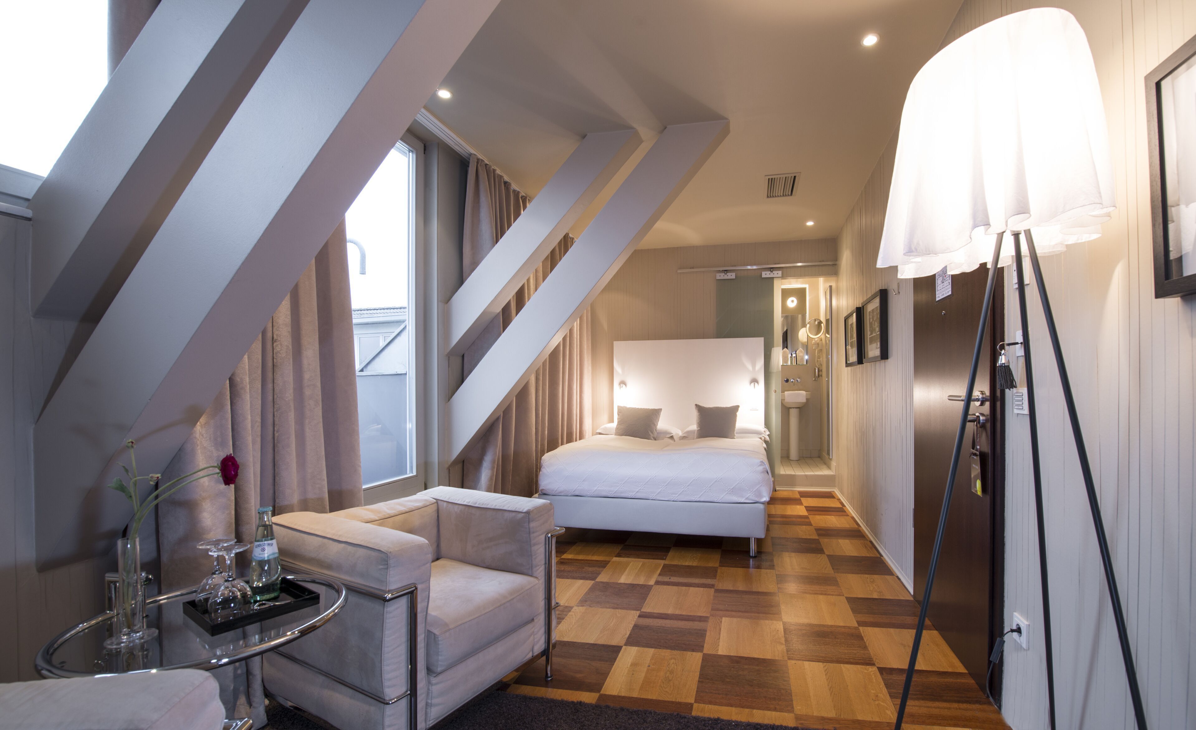 Hypo-allergenic bedding, desk, laptop workspace, blackout drapes