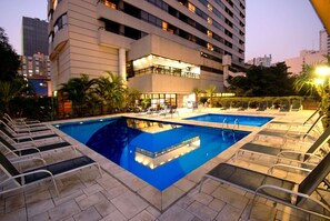 Outdoor pool, open 6:00 AM to 10:00 PM, sun loungers