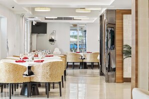 Breakfast, lunch, dinner served; beach views
