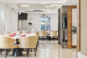 Breakfast, lunch, dinner served; beach views