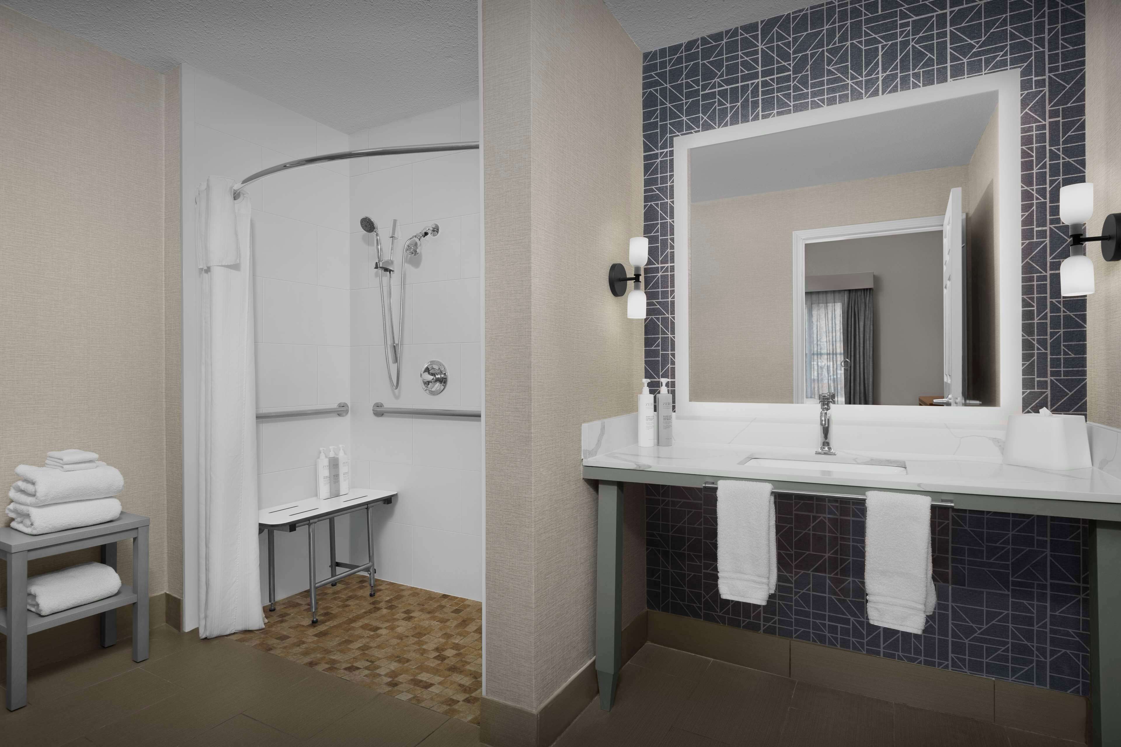 combined shower/bathtub, free toiletries, hair dryer, towels