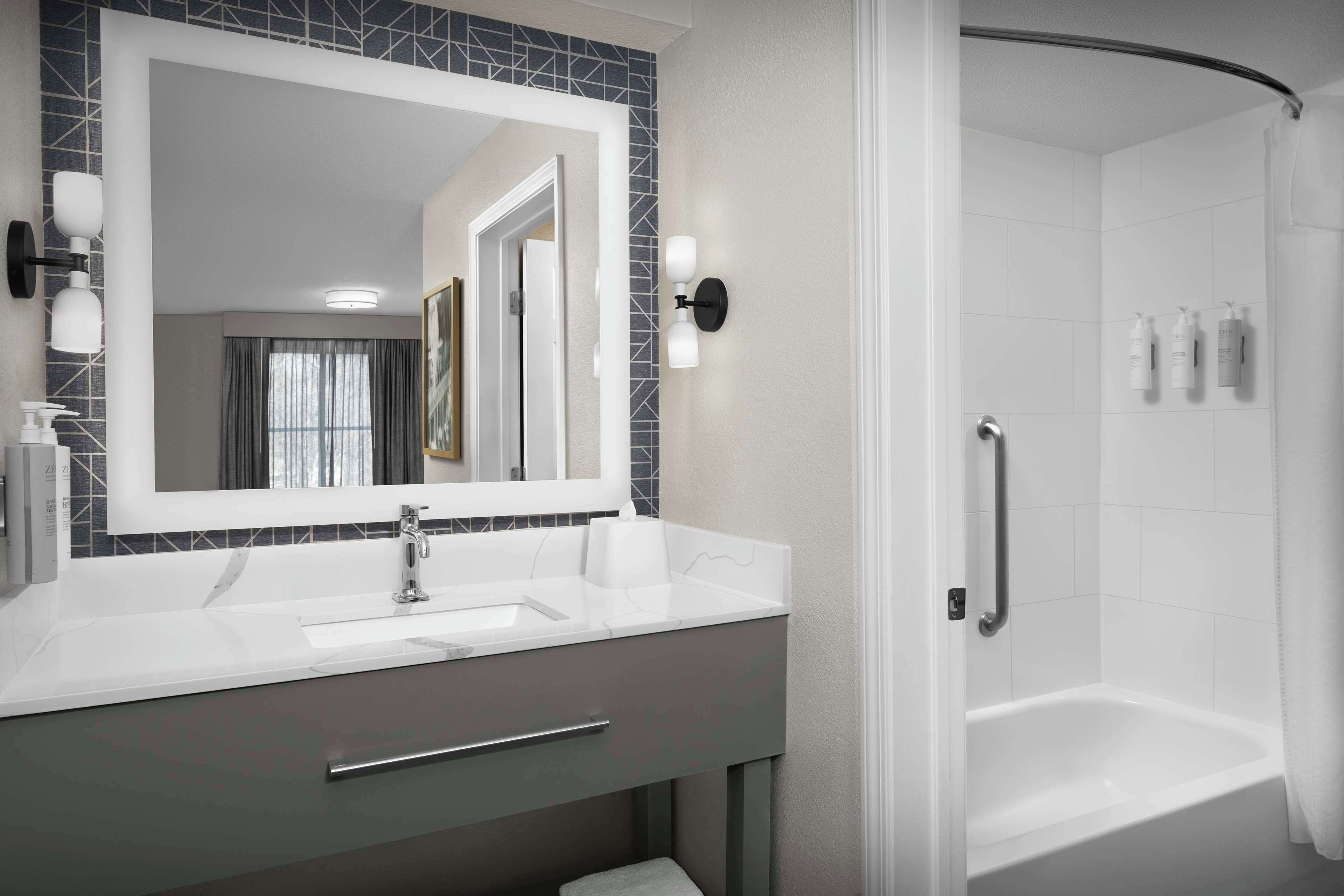 combined shower/bathtub, free toiletries, hair dryer, towels