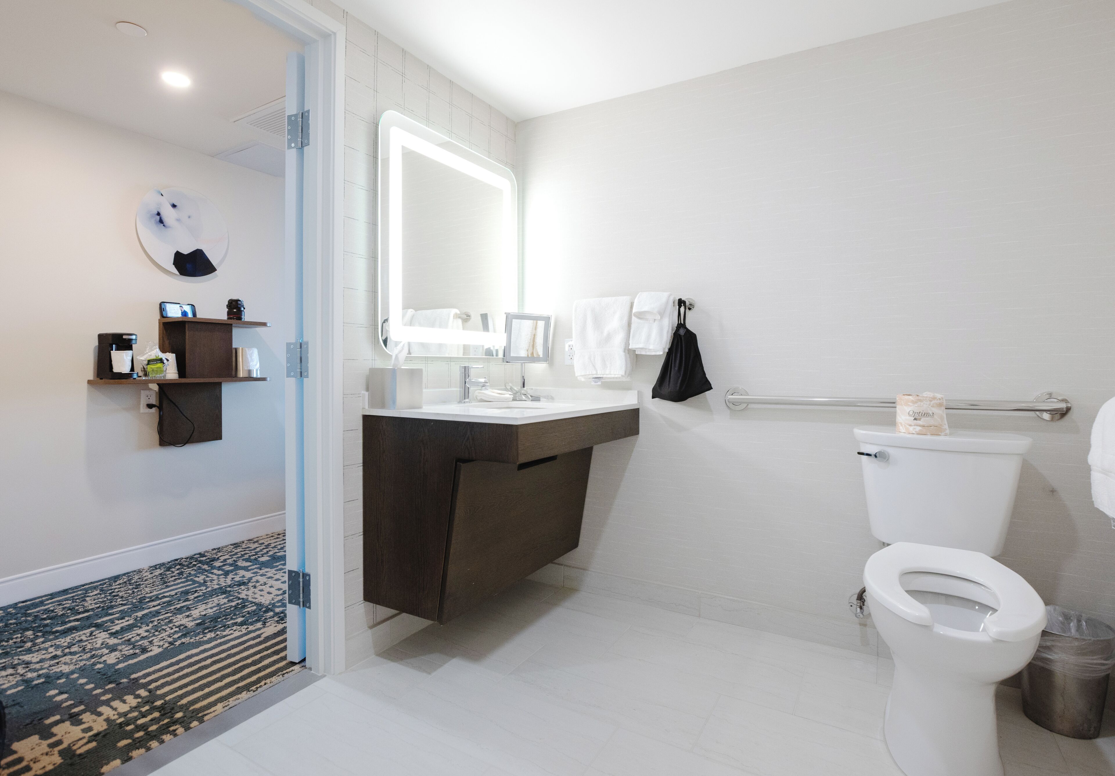 Shower, hydromassage showerhead, eco-friendly toiletries, hair dryer