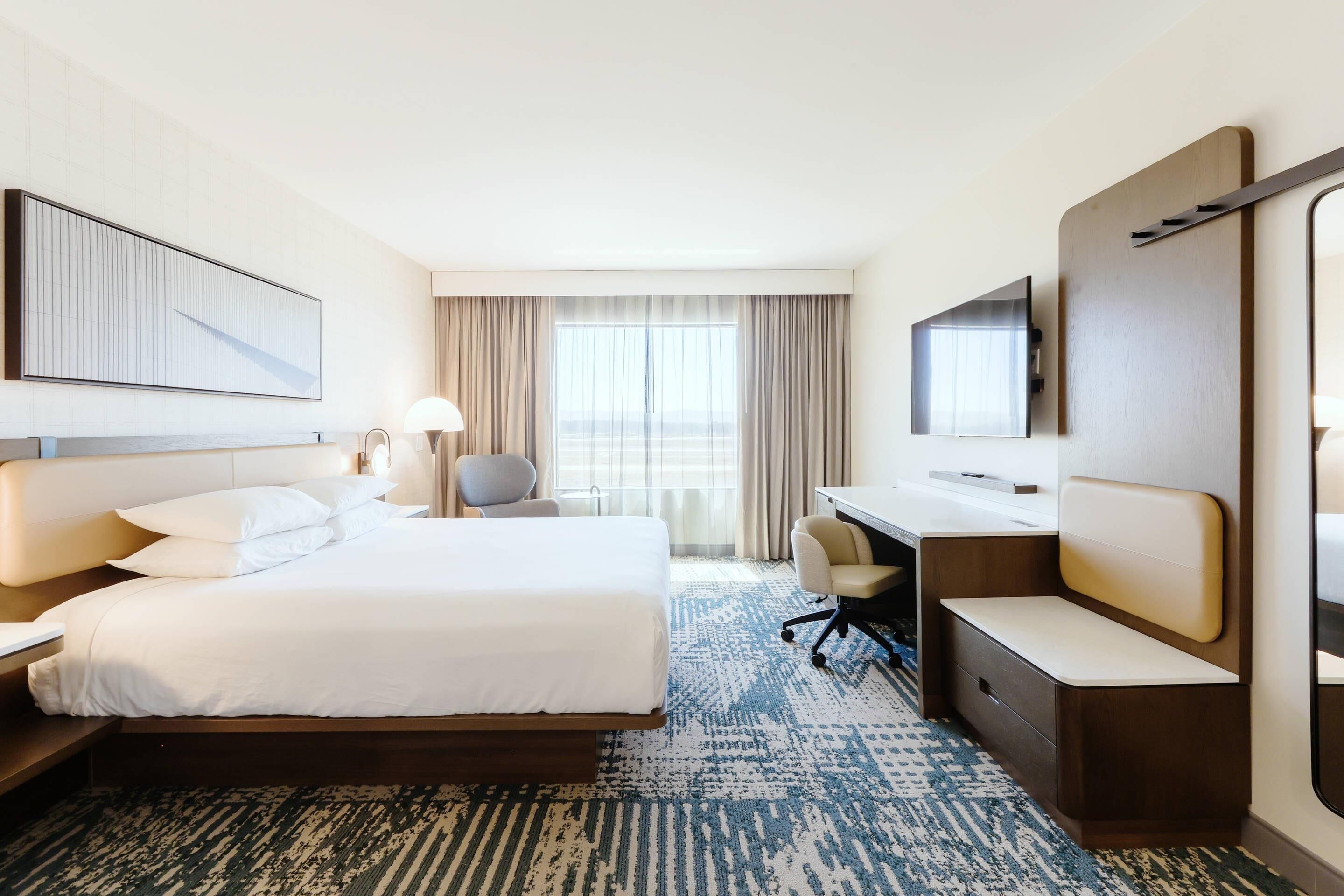 1 King Bed, Newer Room | Desk, blackout drapes, iron/ironing board, free WiFi