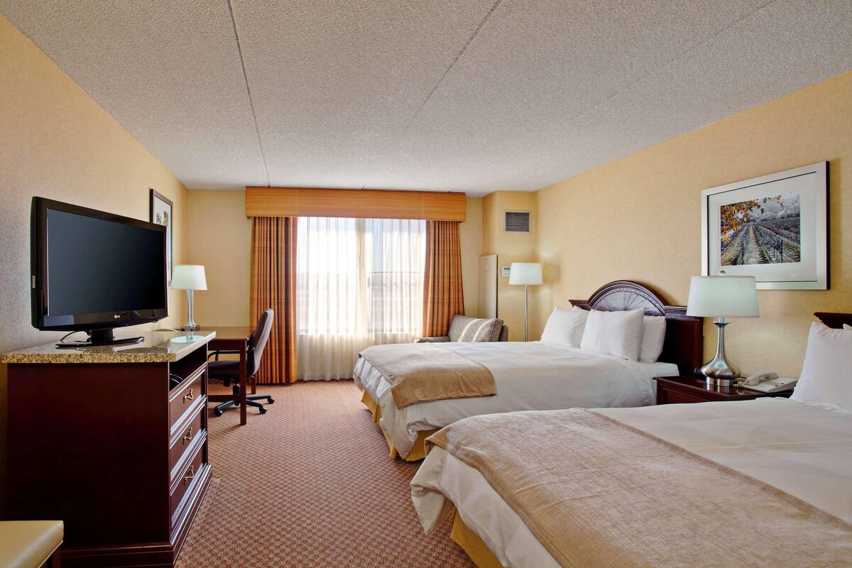Premium bedding, memory foam beds, in-room safe, desk