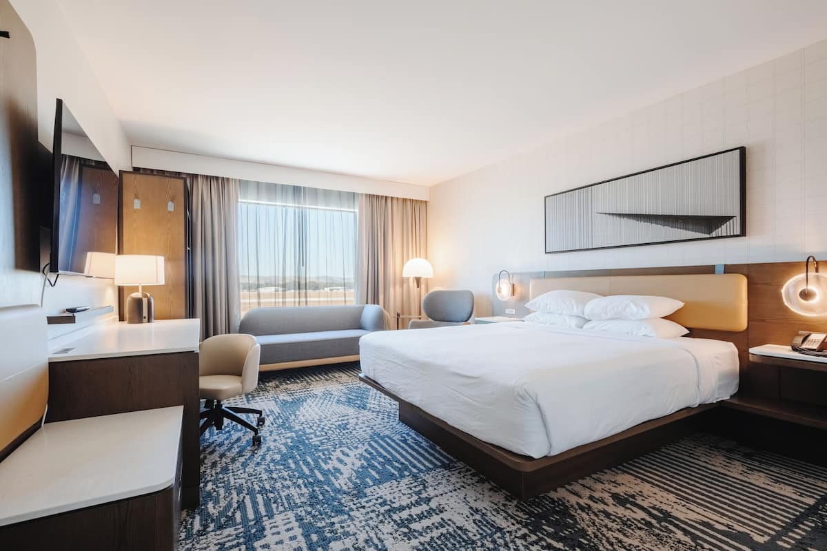 Suite, 1 King Bed, Non Smoking | Premium bedding, memory foam beds, in-room safe, desk