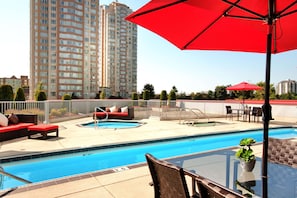 Outdoor pool, open 6:00 AM to 10:00 PM, sun loungers