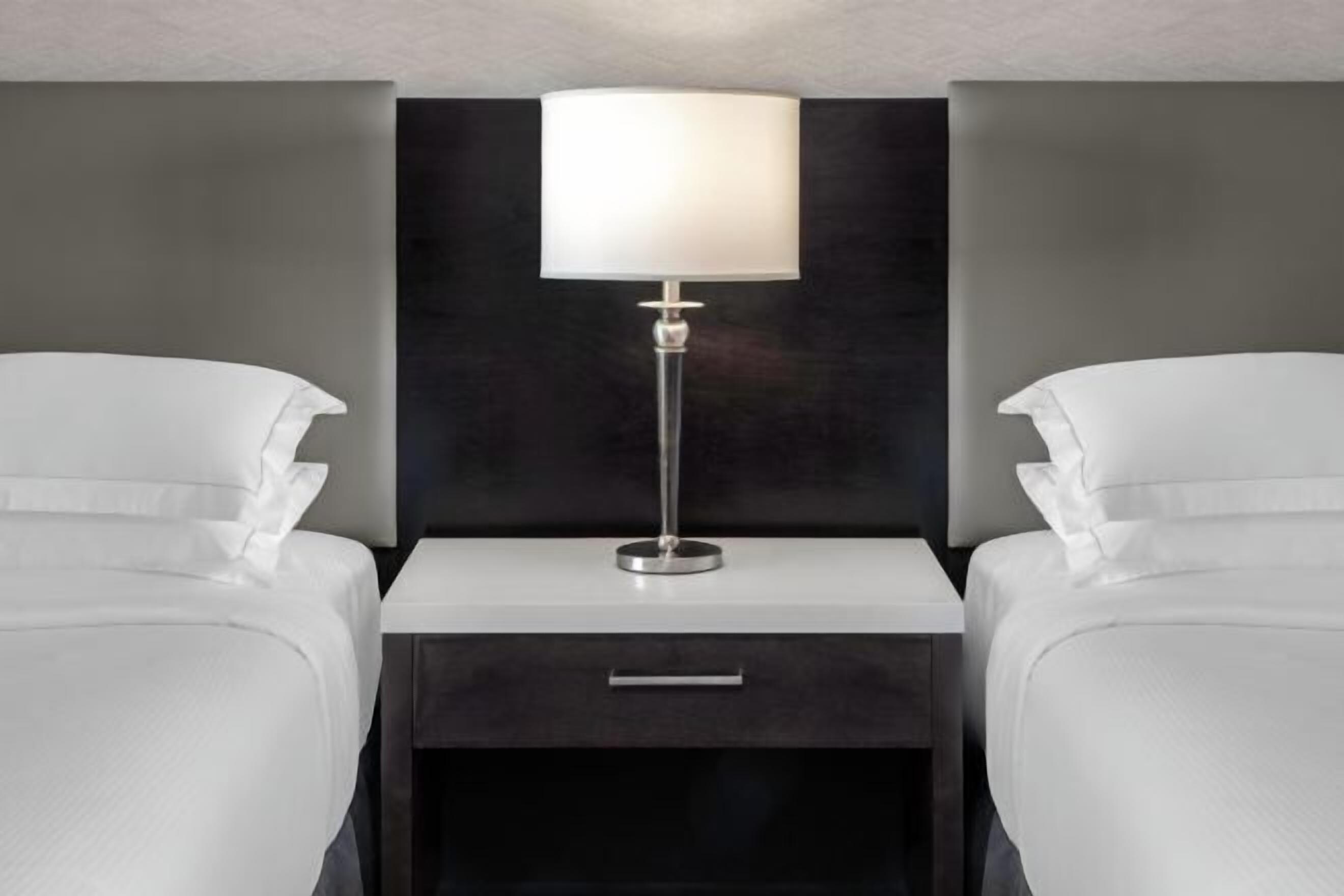 Hypo-allergenic bedding, down comforters, in-room safe, desk