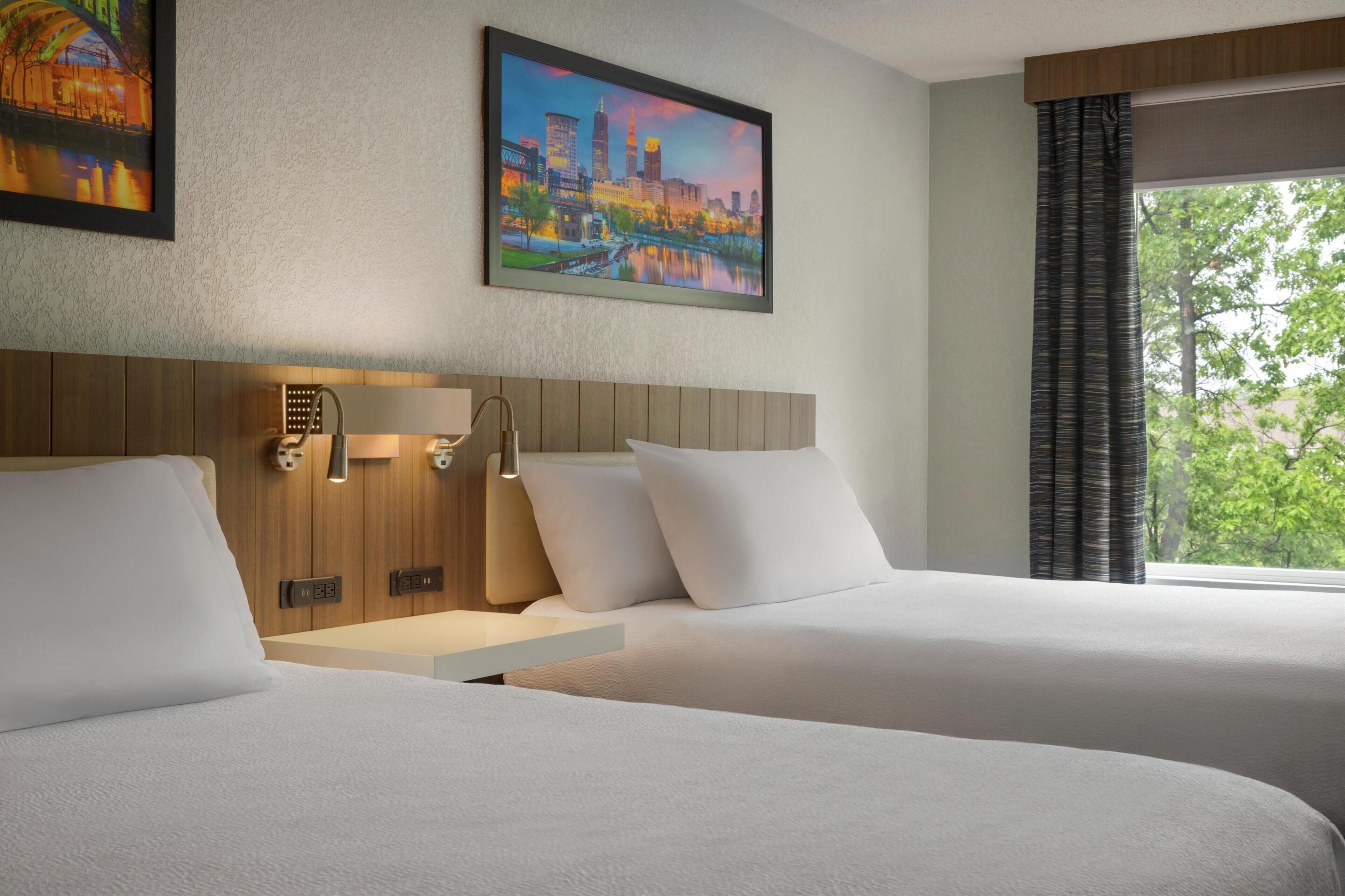 room, 2 queen beds | desk, blackout curtains, iron/ironing board, cots/infant beds