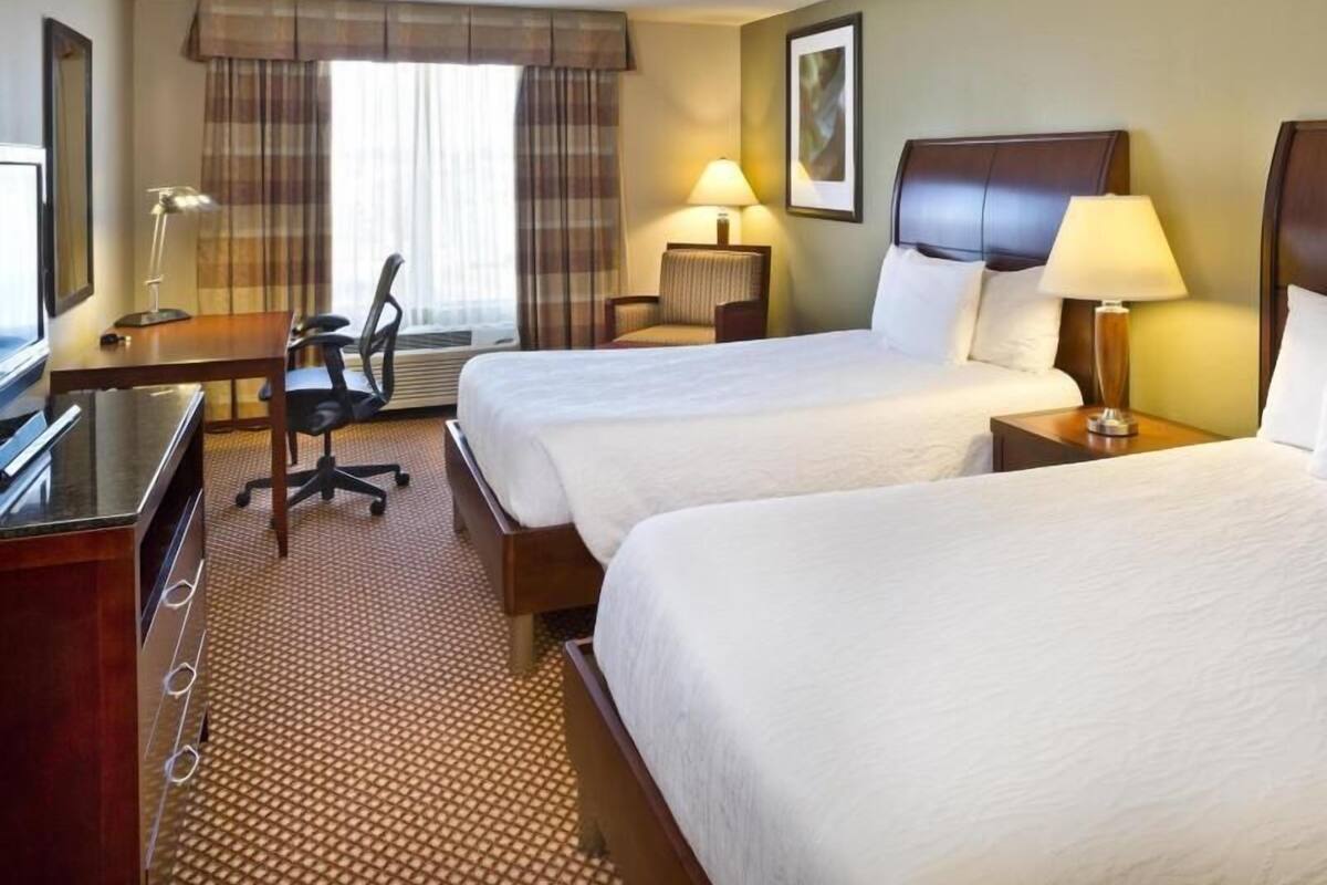 Premium bedding, iron/ironing board, free cribs/infant beds