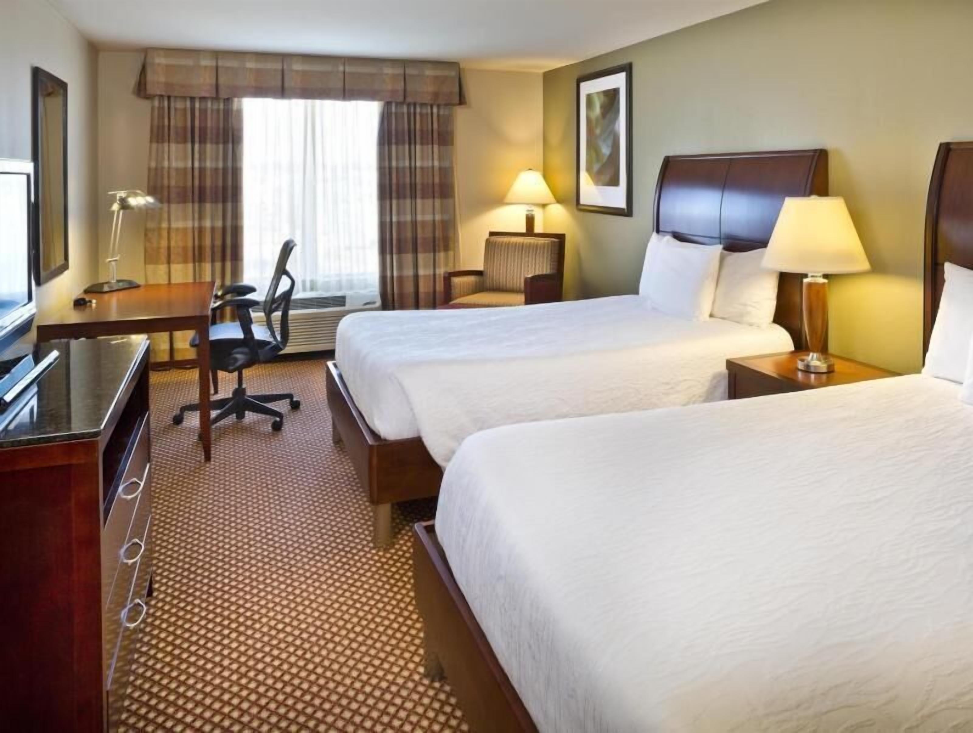 Premium bedding, iron/ironing board, free cribs/infant beds