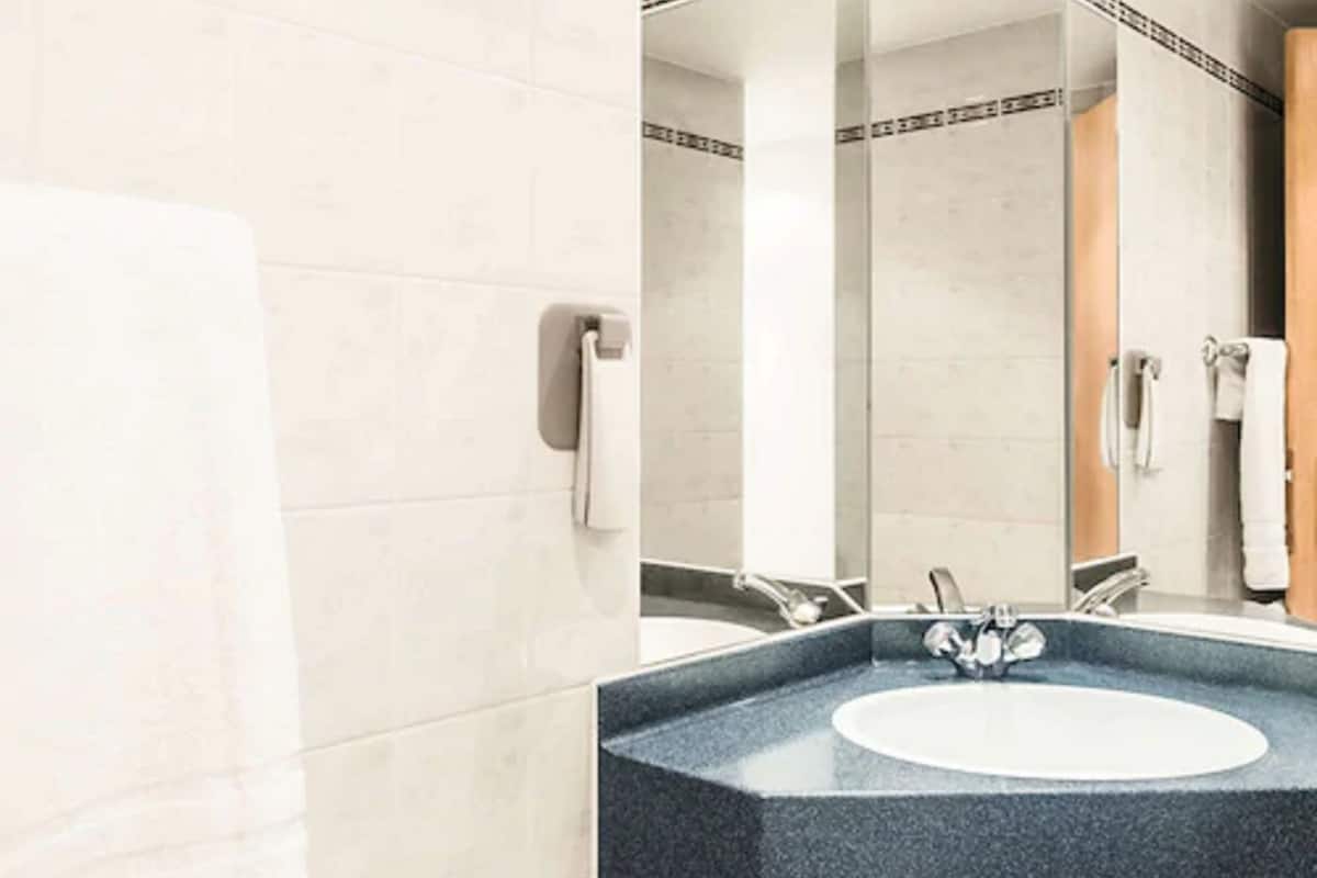 shower, eco-friendly toiletries, hair dryer, towels